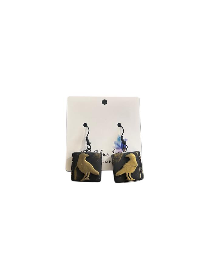 Handcrafted gothic book earrings with raven silhouette