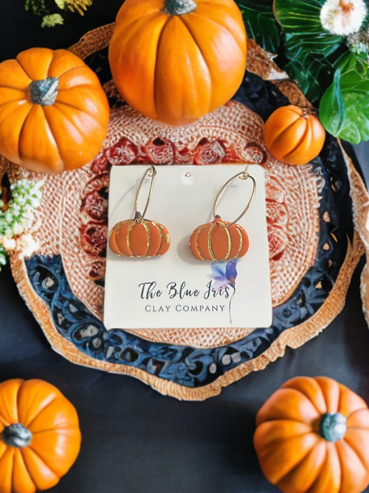 Handmade pumpkin hoop earrings with gold foil details – polymer clay jewelry