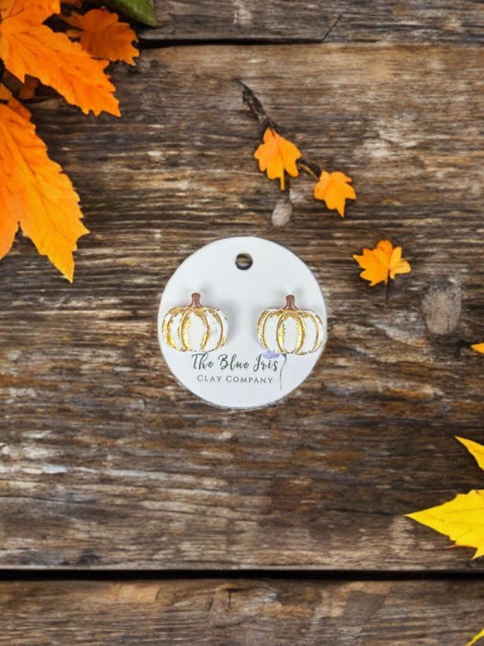 Cute handmade polymer clay pumpkin stud earrings with shimmering gold leaf, lightweight and comfortable