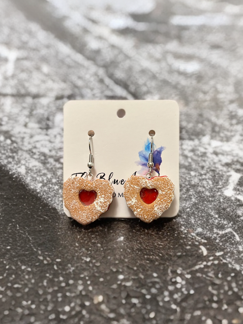 Cute dessert-inspired earrings shaped like glassy heart cookies