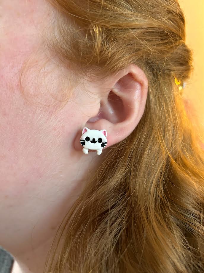 Close-up of cute cat face stud earrings, lightweight handmade polymer clay jewelry