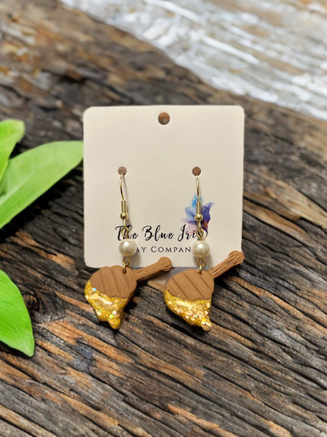Handmade polymer clay honey wand earrings with resin drip and pearl accent