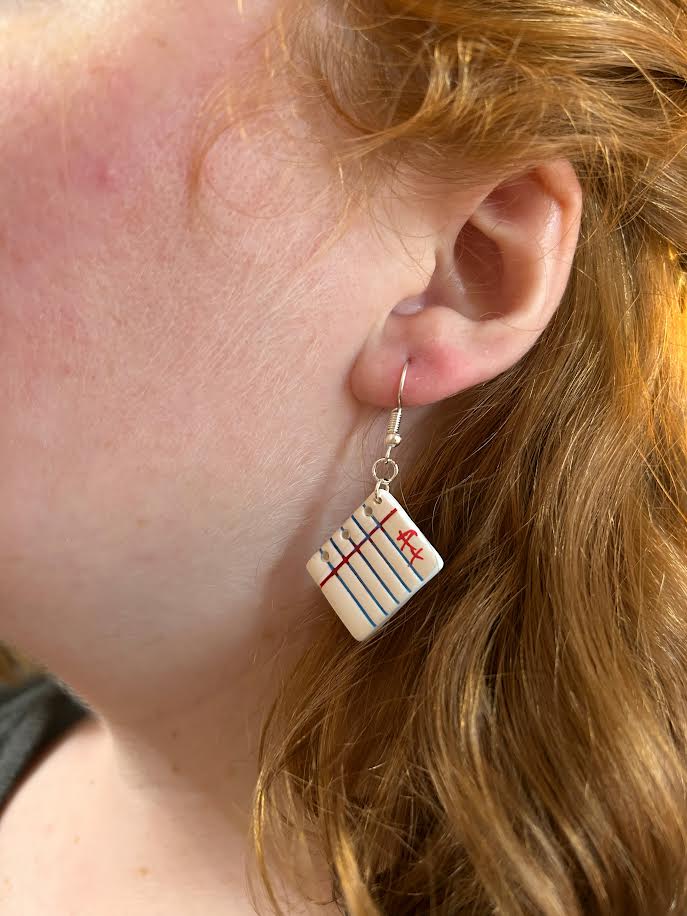 Handmade polymer clay dangle earrings, lined paper with A+ design, ideal for quirky and nerdy style lovers
