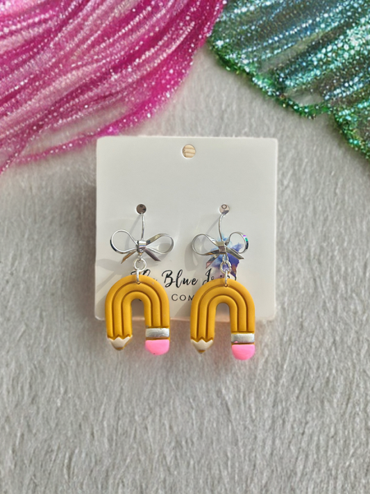 Handmade polymer clay pencil earrings with bow-shaped French wire hooks